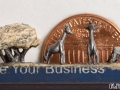pencil carving of a giraffe family - with penny