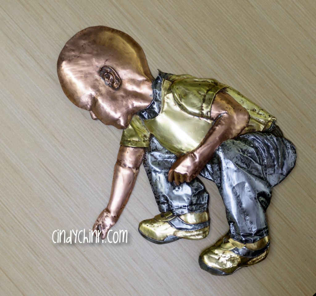 Fabricated metal boy from copper, brass, aluminum