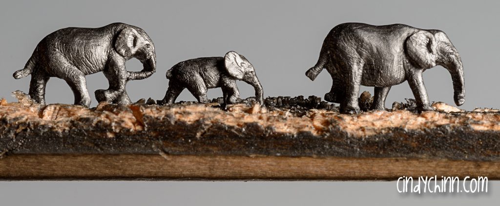 Elephant art - Elephants carved from a carpenter's pencil