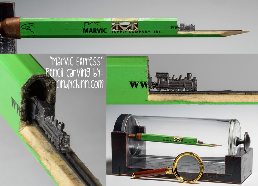 Train carved from a pencil lead by Cindy Chinn - Marvic Express