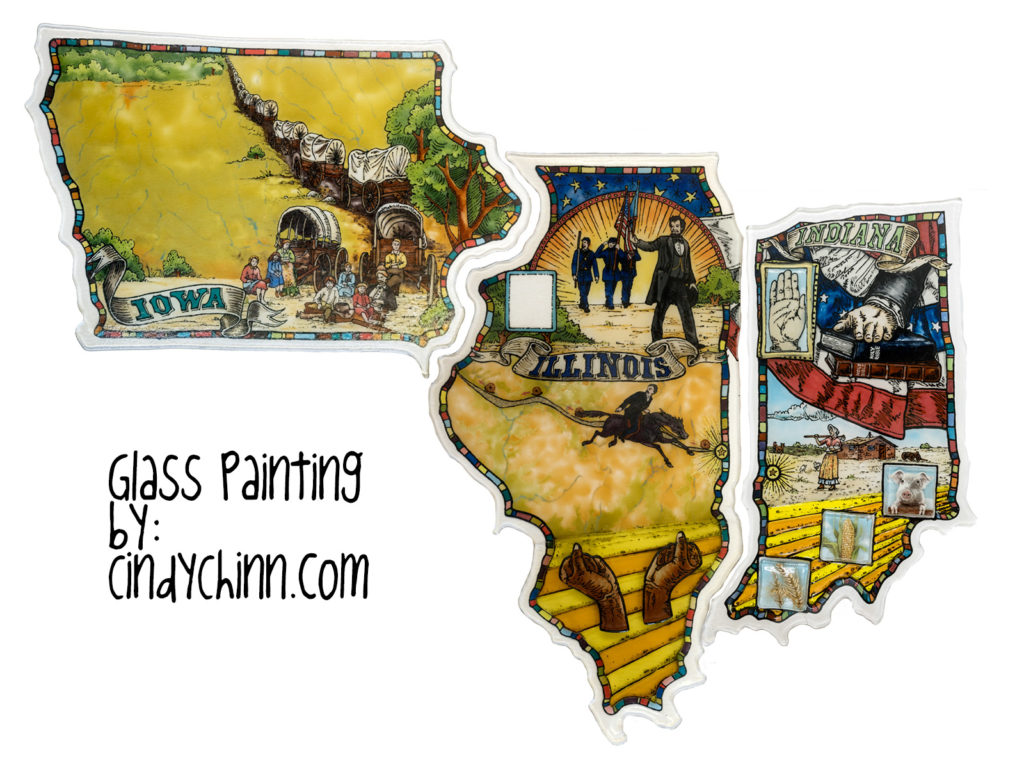 Glass art of Iowa, Illinois and Indiana in various states of completion.