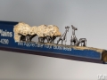 pencil carving of a giraffe family - angled