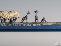 pencil carving of a giraffe family - detail