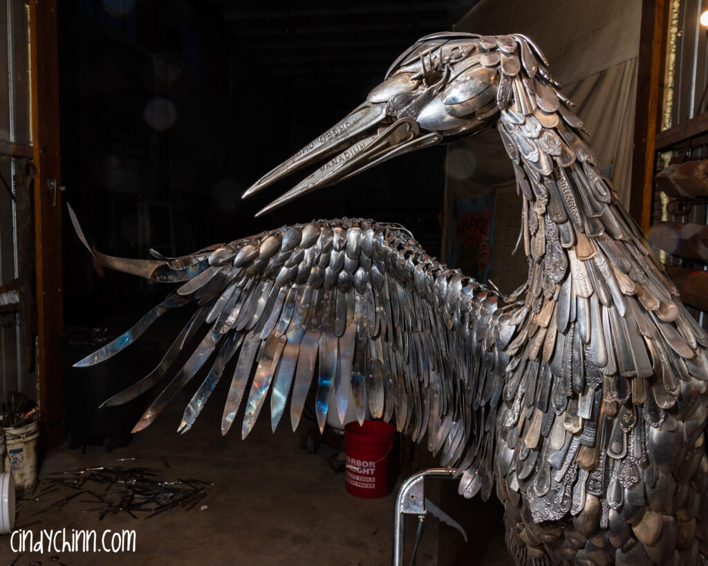 sandhill crane sculpture made from cutlery life size metal art