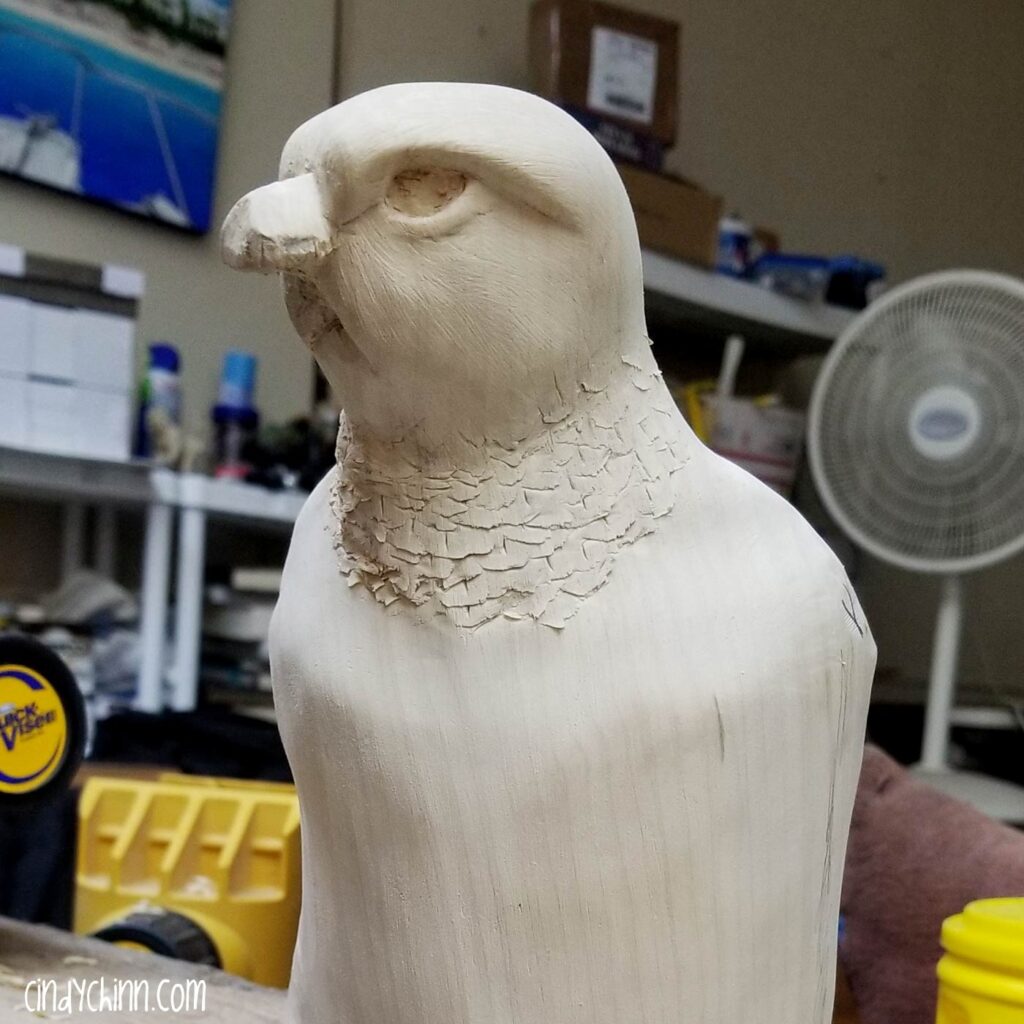 Falcon wood carving in progress.