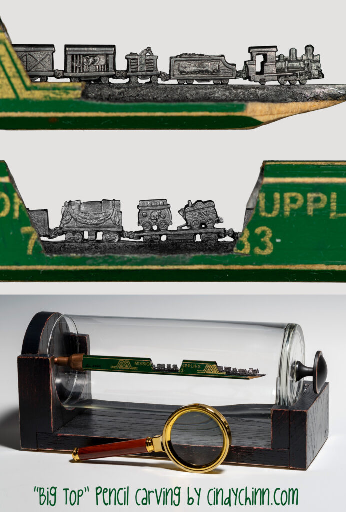 Big Top Train carved from a pencil lead - detailed work by Cindy Chinn
