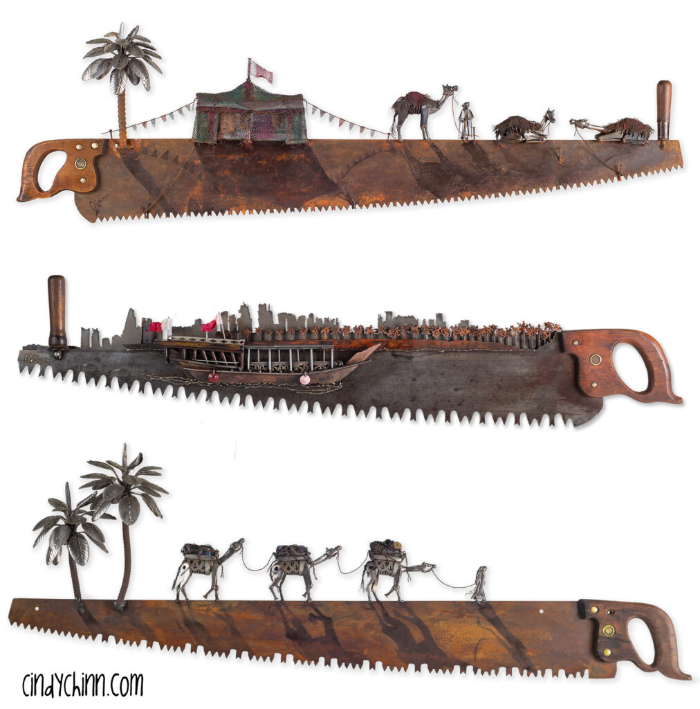 Metal wall art from old saws featuring Arabic scenes with camels and dhows by Cindy Chinn